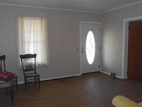 Living Room is separate from den, dining and kitchen