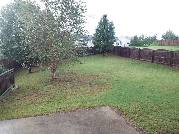 Large, fenced backyard for gardening, playing or entertaining!