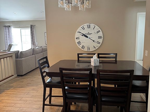 Dining area with previous tenants furniture.
View to living room