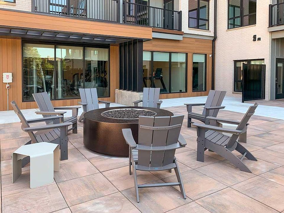 Gather around the fire pit for cozy evenings and good companyjust steps from your front door.
