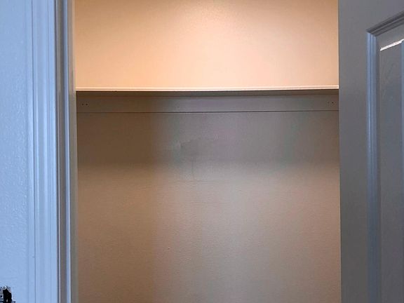 One of the two large closets in the master bedroom