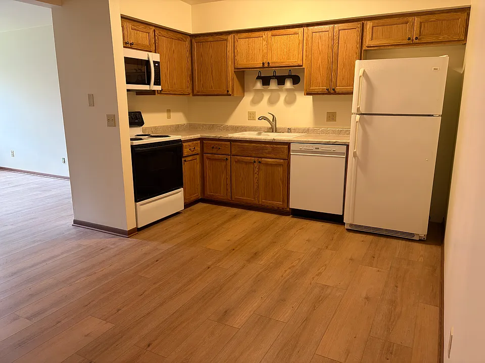 This photo is of a similar apartment with same layout. Minor details may vary.