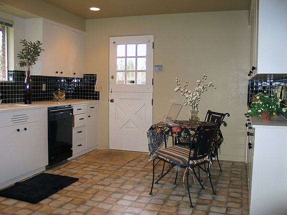 The kitchen has a new floor & dishwasher.