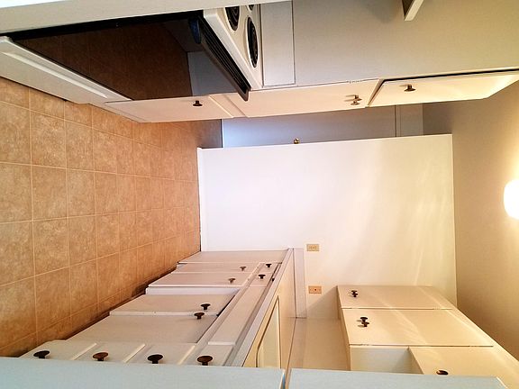 Gally style kitchen with seperate dining area (not shown).