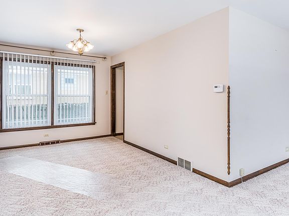 DINING ROOM W/ ACCESS TO GARAGE.