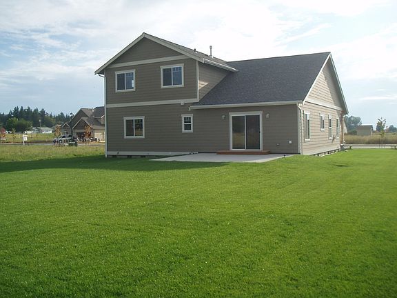 Enjoy the spacious rear yard.