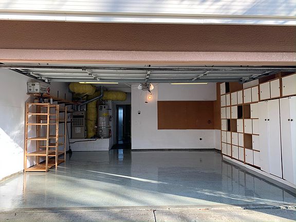 Attached 2 car garage with plenty of storage