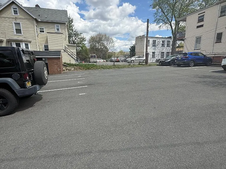Two assigned parking spots with apartment