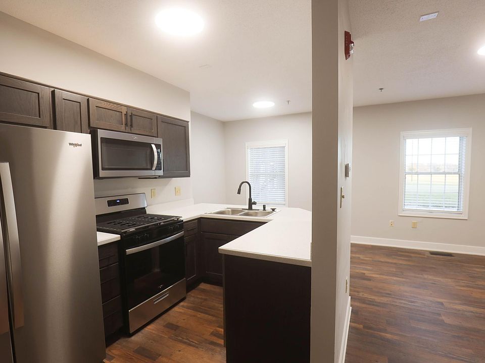 Entry into Kitchen / Living Room Area. Stackable washer/dryer is in an open closet located directly before entering this room.