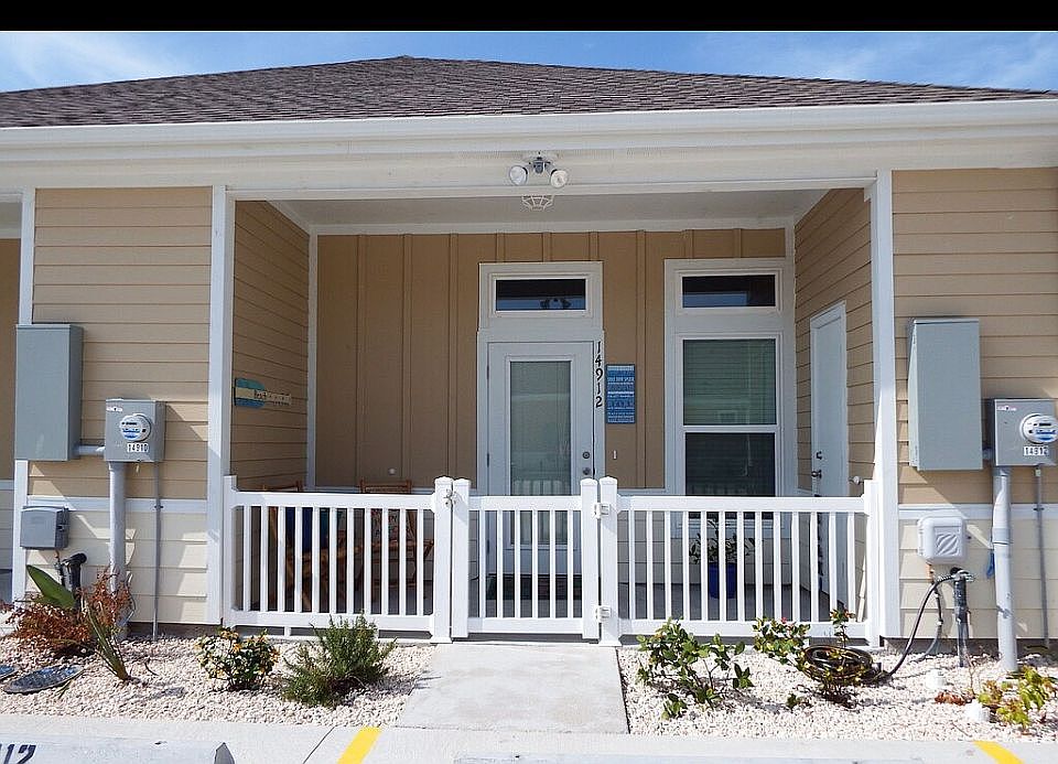 Gated porch w/storage closet