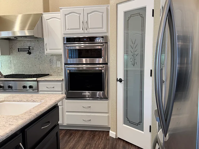 Large kitchen with an easy access pantry