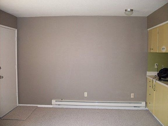 After, new carpet, paint, new resurfaced cabinets