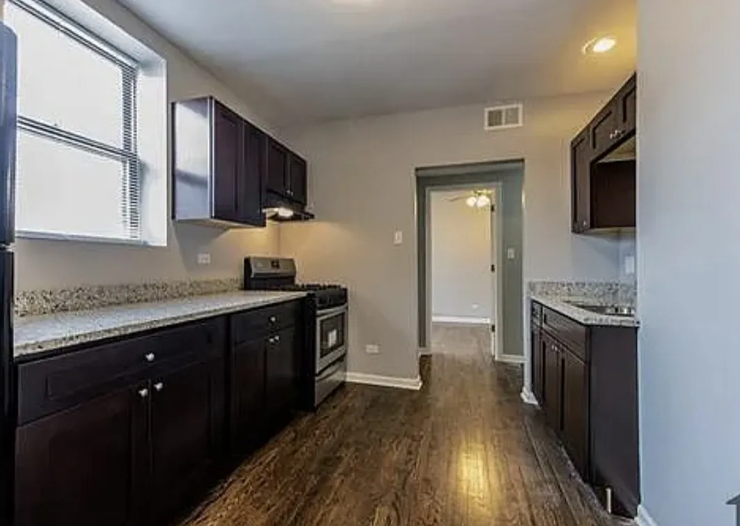 Building Photo - 7529 S Kingston Ave #1