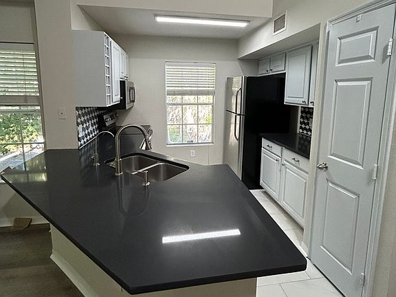 2nd image of 13703 Richmond Park Dr N APT 2206