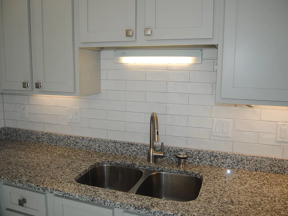 Granite countertops & ample cabinet storage