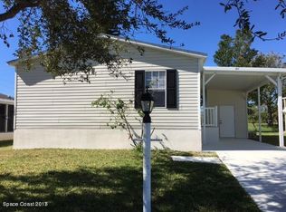 1047 Wren Cir, Barefoot Bay, FL 32976