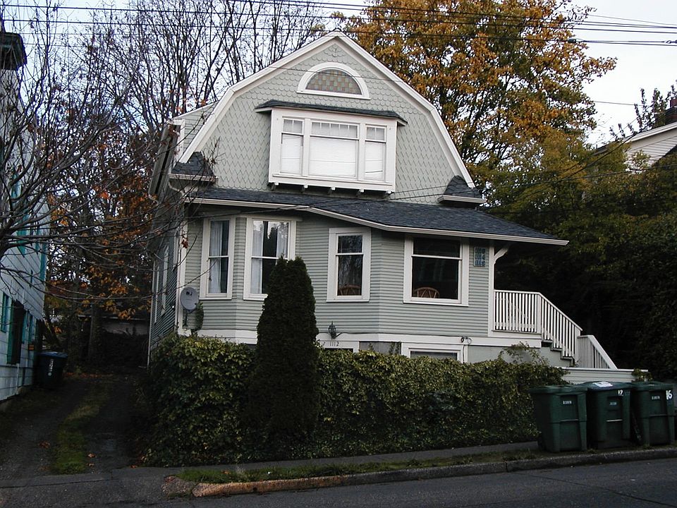 Front of triplex, bus stop now in front.