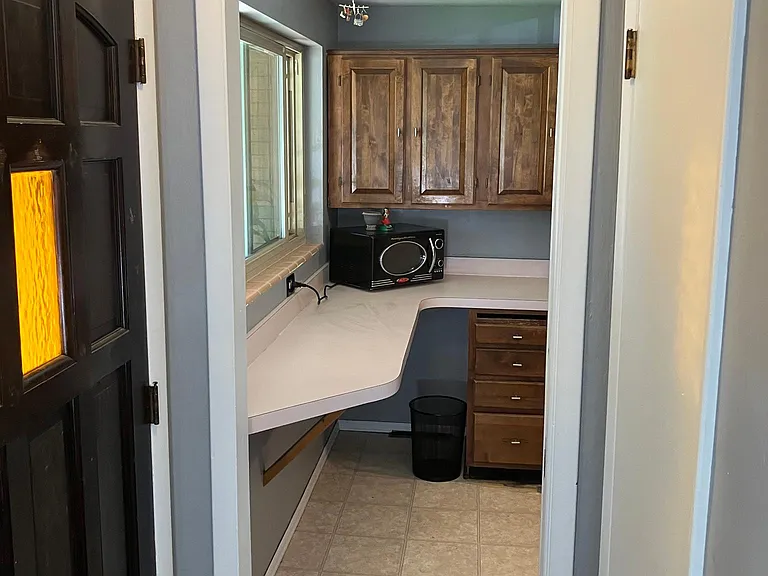 View into kitchen near front door