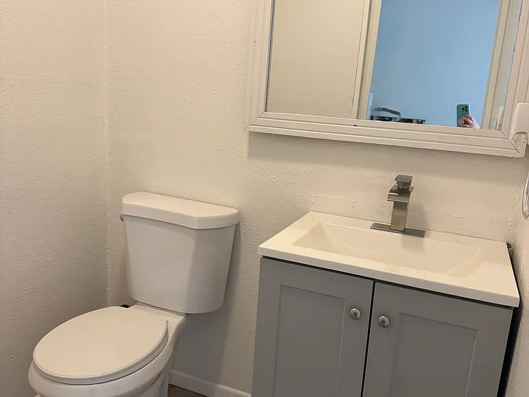 Brand new vanity, sink, faucet and toilet in 1/2 bathroom