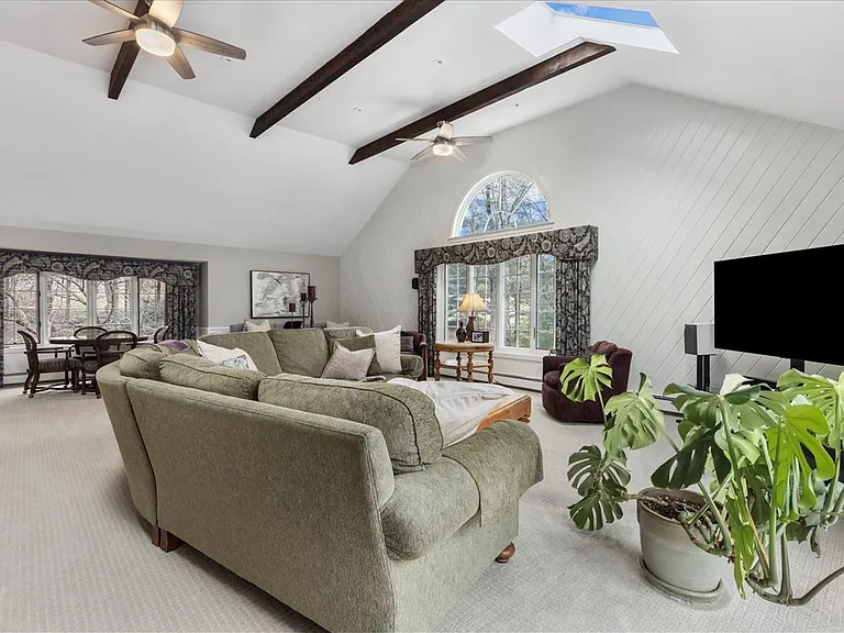 Great room boast 18' ceilings and skylights.