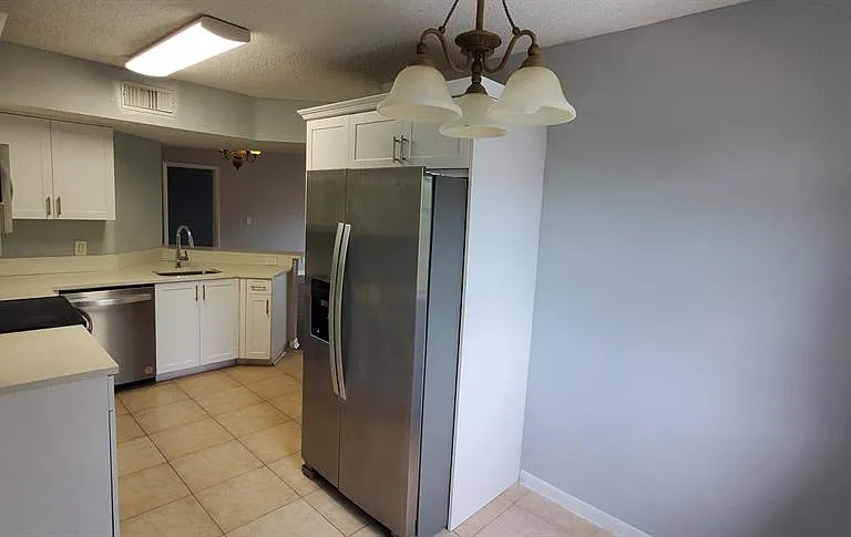 9033 Wiles Rd — Photo 4