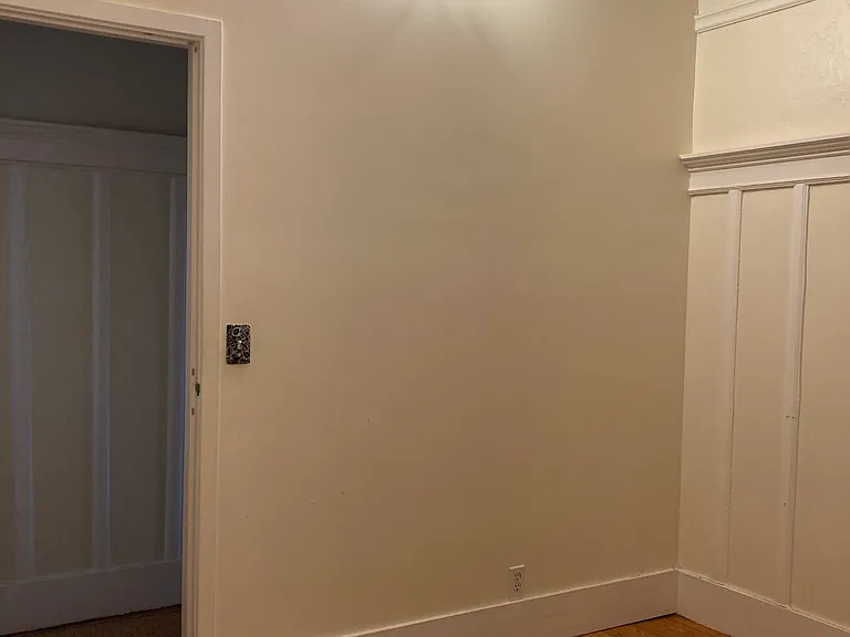 Bedroom with doorway from hallway