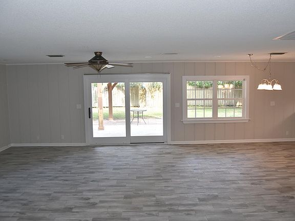 Living/Dining room looking toward rear of house