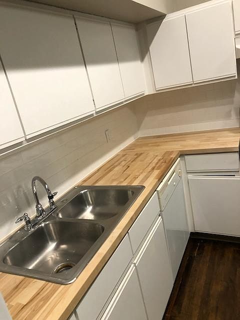 Butcherblock Countertops; White Subway Tile Backsplash
