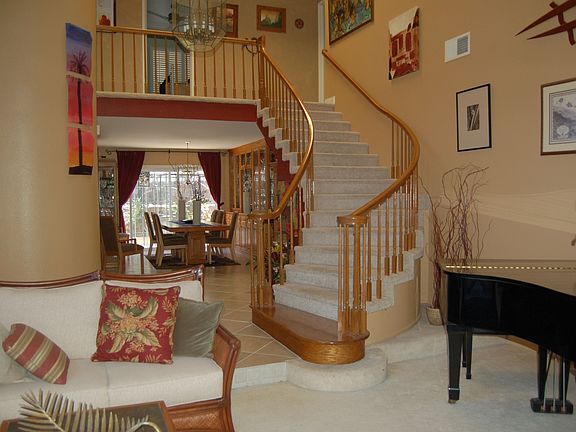 Living Room with Spiral Staircase.