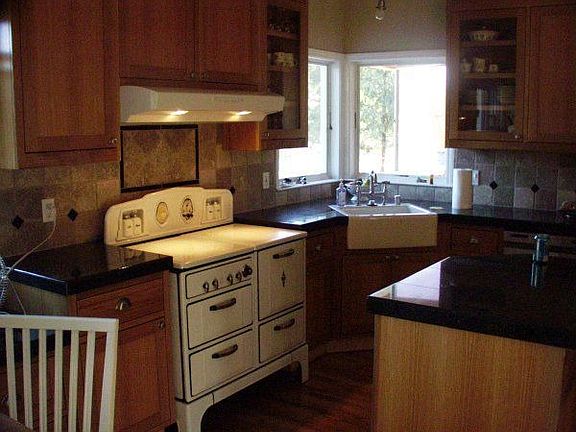 Antique stove in custom kitchen