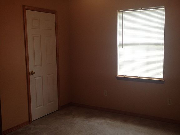 fourth bedroom all with ceiling fans