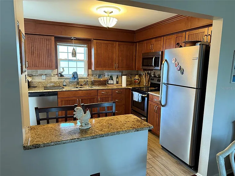 1706 Belleair Forest Dr #226 — Photo 7