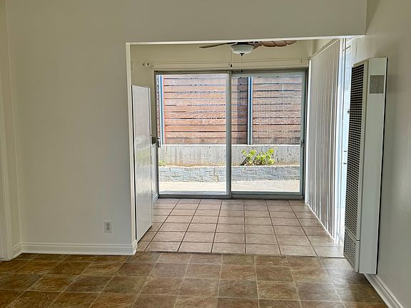 View from living room into kitchen & back yard