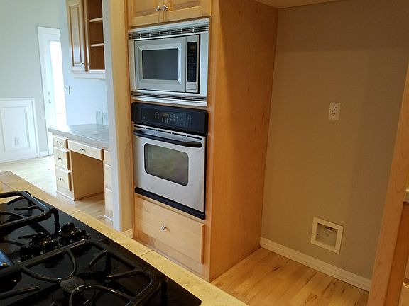 Kitchen built in ovens and desk area central island
