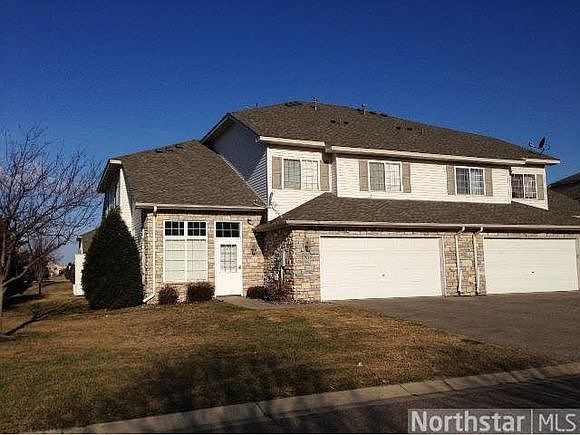 End unit, large grass area, attached garage