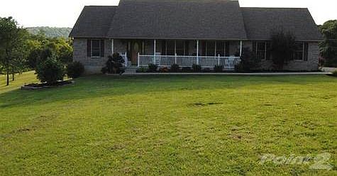 Beautiful 3 bedroom, 3 bath brick ranch in a country setting!