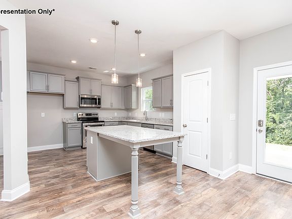 The eat-in Kitchen with our Stone Grey Cabinetry