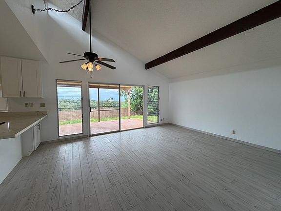 Living Room view 2. Spacious living room, vaulted ceilings, panoramic views from this perimeter lot