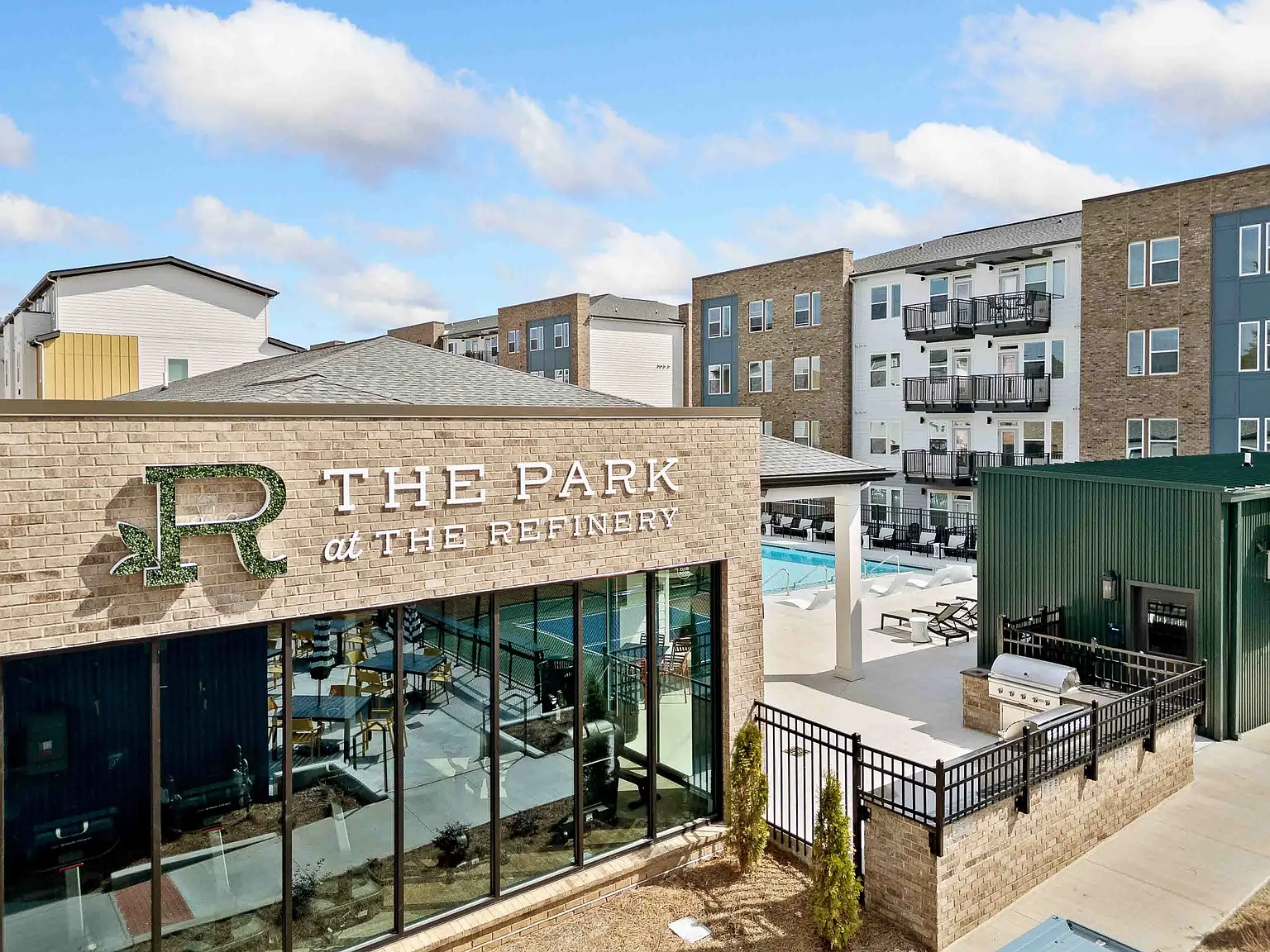 The Refinery at Sugar Hill Apartments and Townhomes — Photo 1