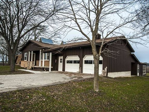 The home backs up to beautiful farm land.