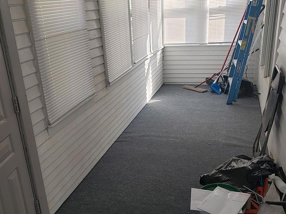 Enclosed Front Porch.