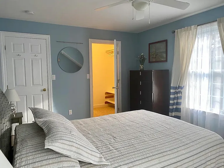 2nd floor bedroom with queen bed and large walk-in closet