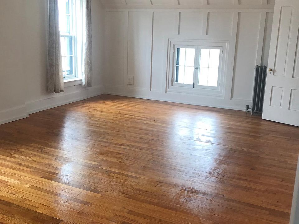 Living room area- spacious, high ceiling and a lot of natura