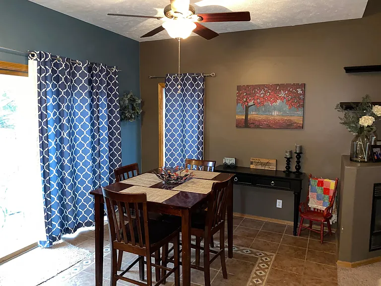 Dining area with sliding door to backyard patio