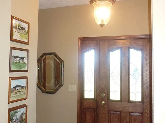 leads to welcoming foyer & in