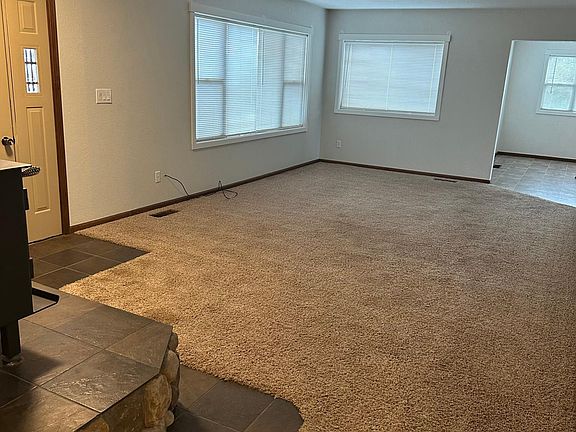 Living Room (loads of natural light) into Dining area
