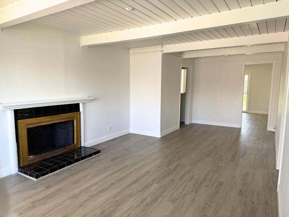 Large, welcoming living space with fireplace