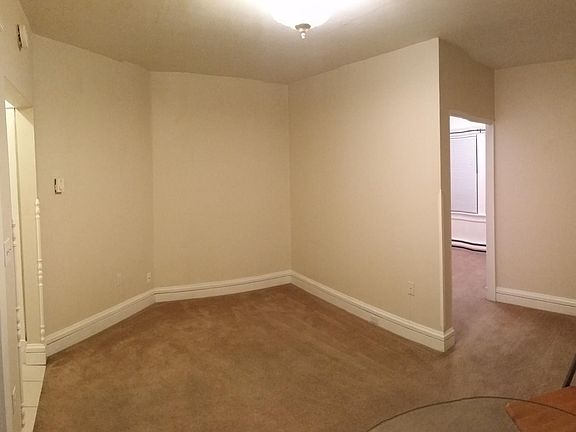 Living Room and entrance to Bedroom (on right)