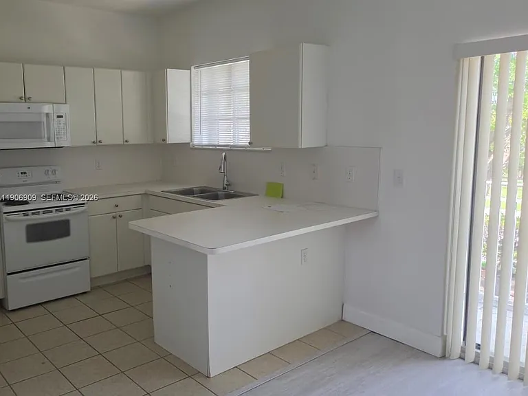 2590 NE 3rd Dr #203 — Photo 7