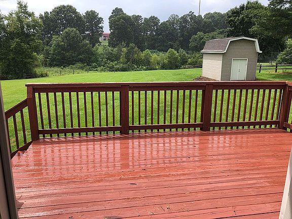 BACK DECK WITH STORAGE BLDG